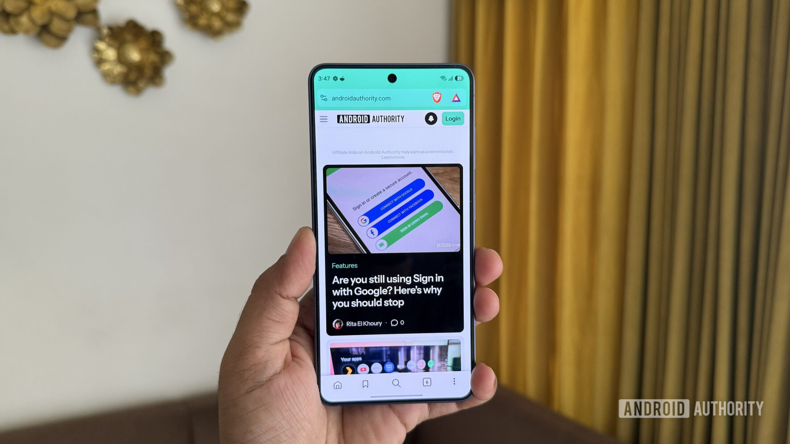 Android-phone-in-hand-showing-Brave-browser-scaled-1