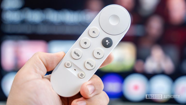 Chromecast-with-Google-TV-remote-on-hand-stock-photo-1