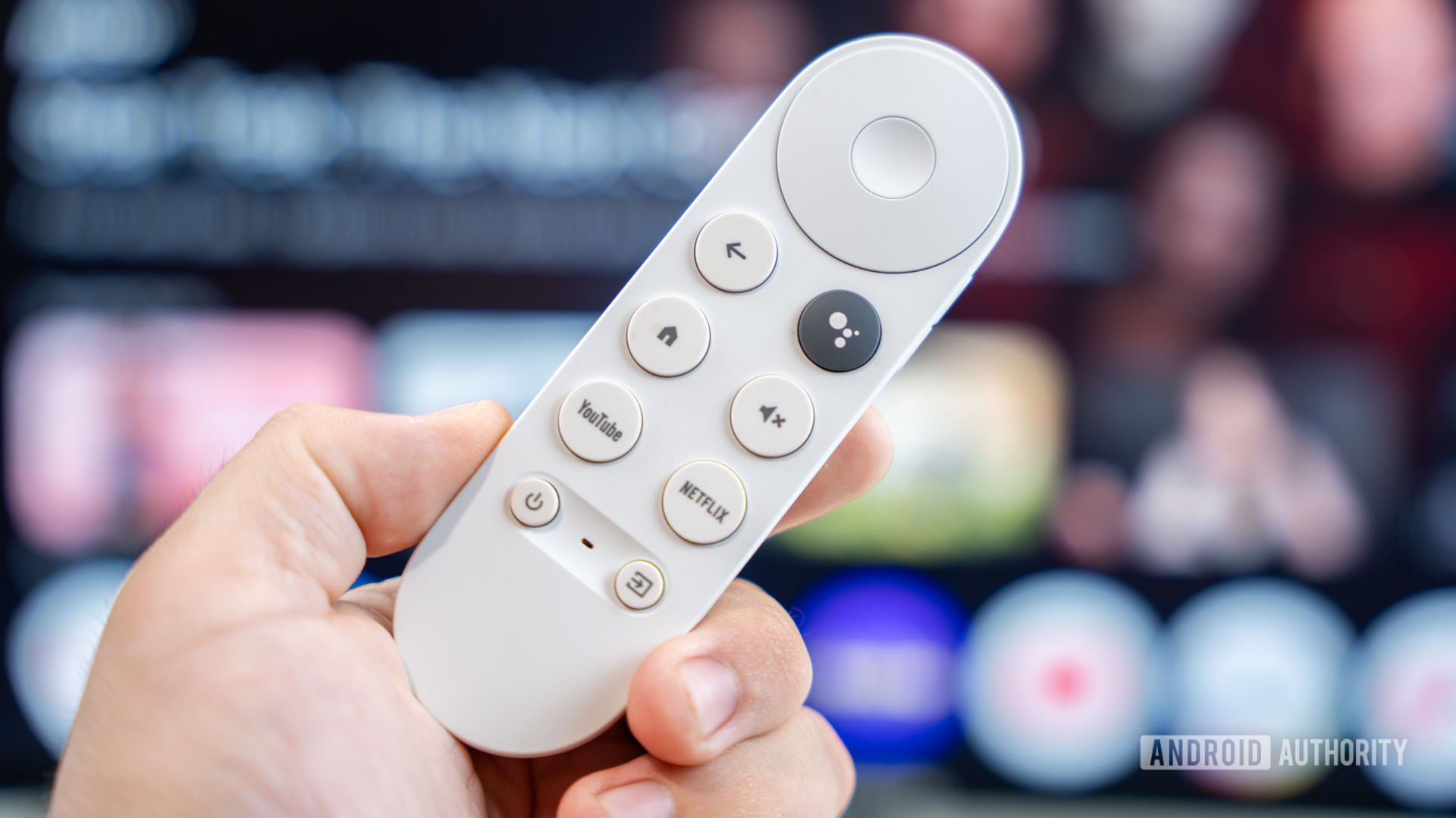 Chromecast-with-Google-TV-remote-on-hand-stock-photo-1
