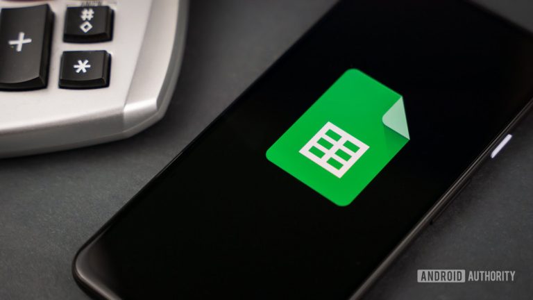 Google-Sheets-next-to-calculator-stock-photo-2