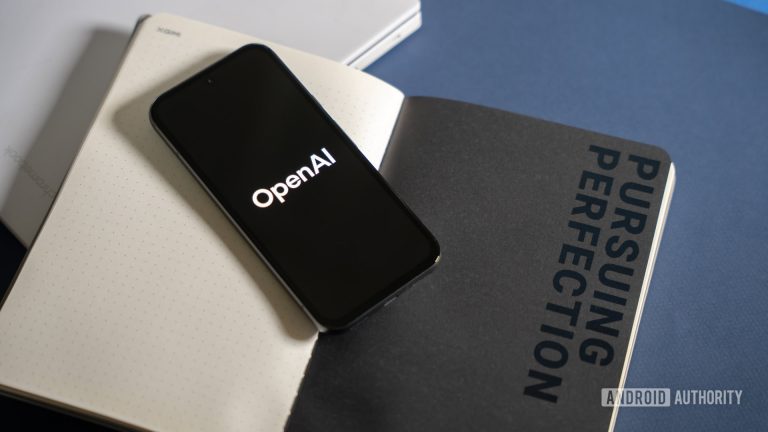 Open-AI-ChatGPT-logo-on-phone-stock-photo-1