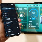 HomeAssistant-app-on-phone-with-dashboard-in-background-scaled-1