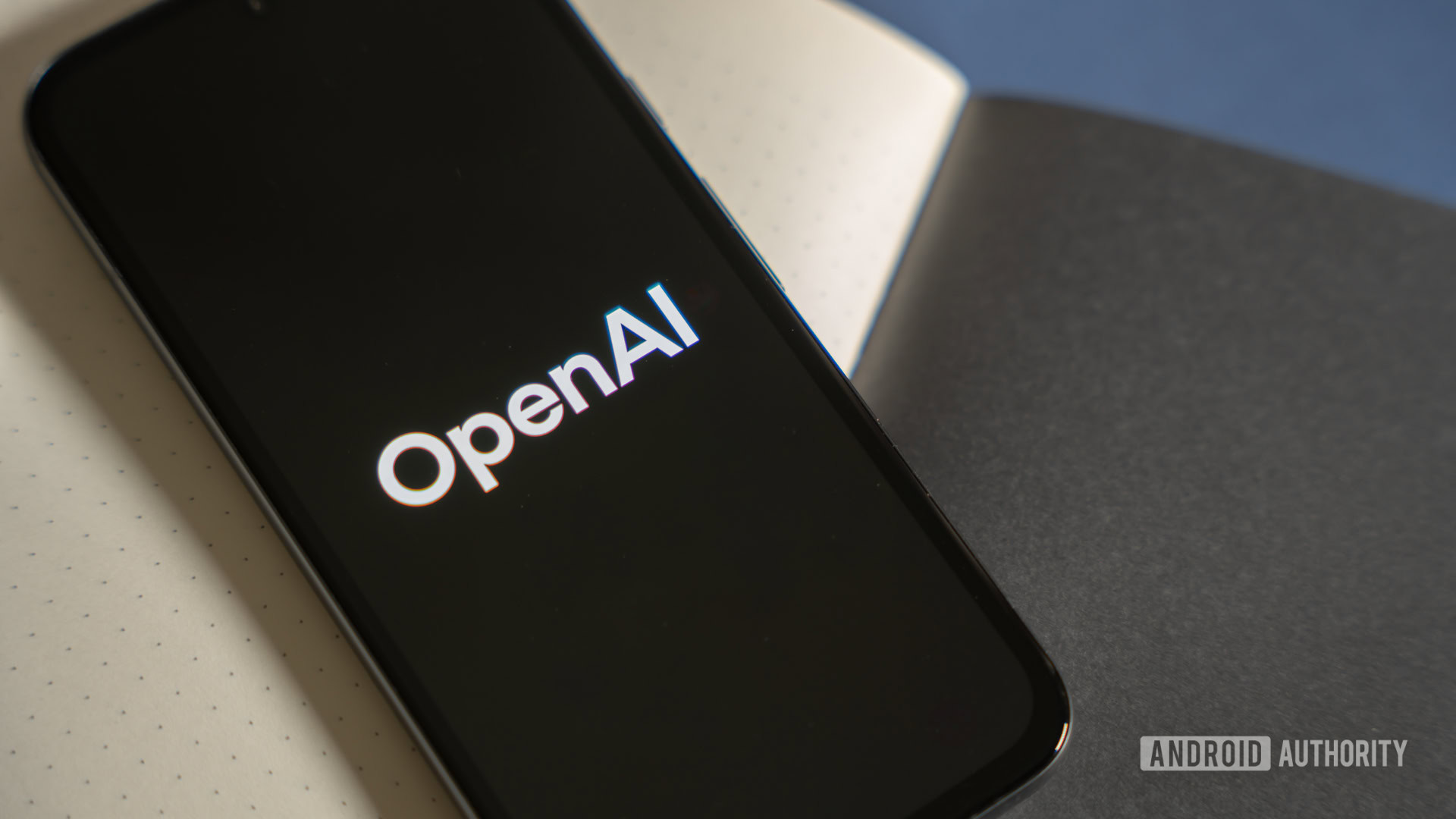 Open-AI-ChatGPT-logo-on-phone-stock-photo-2
